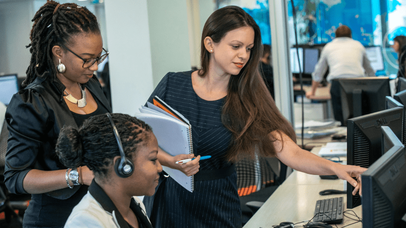 Colleagues at computer