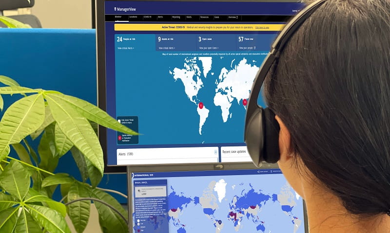 Female manager on call watching at manager view screen