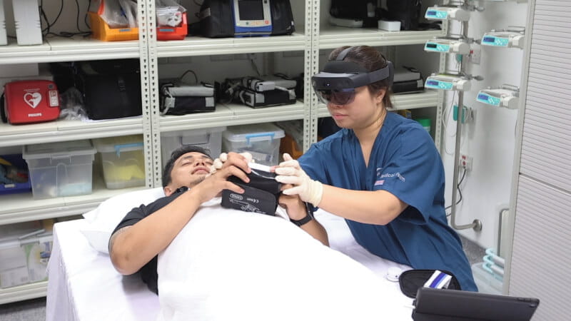 doctor examining patient in Singapore